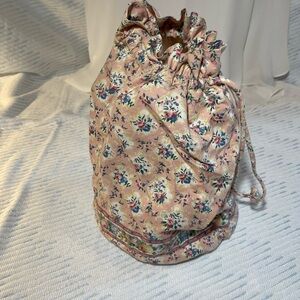 Vera Bradley light pink diddy bag. Cute bag has plastic liner and drawstrings.